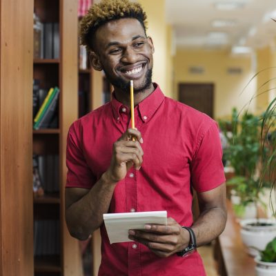 cheerful-man-with-notepad